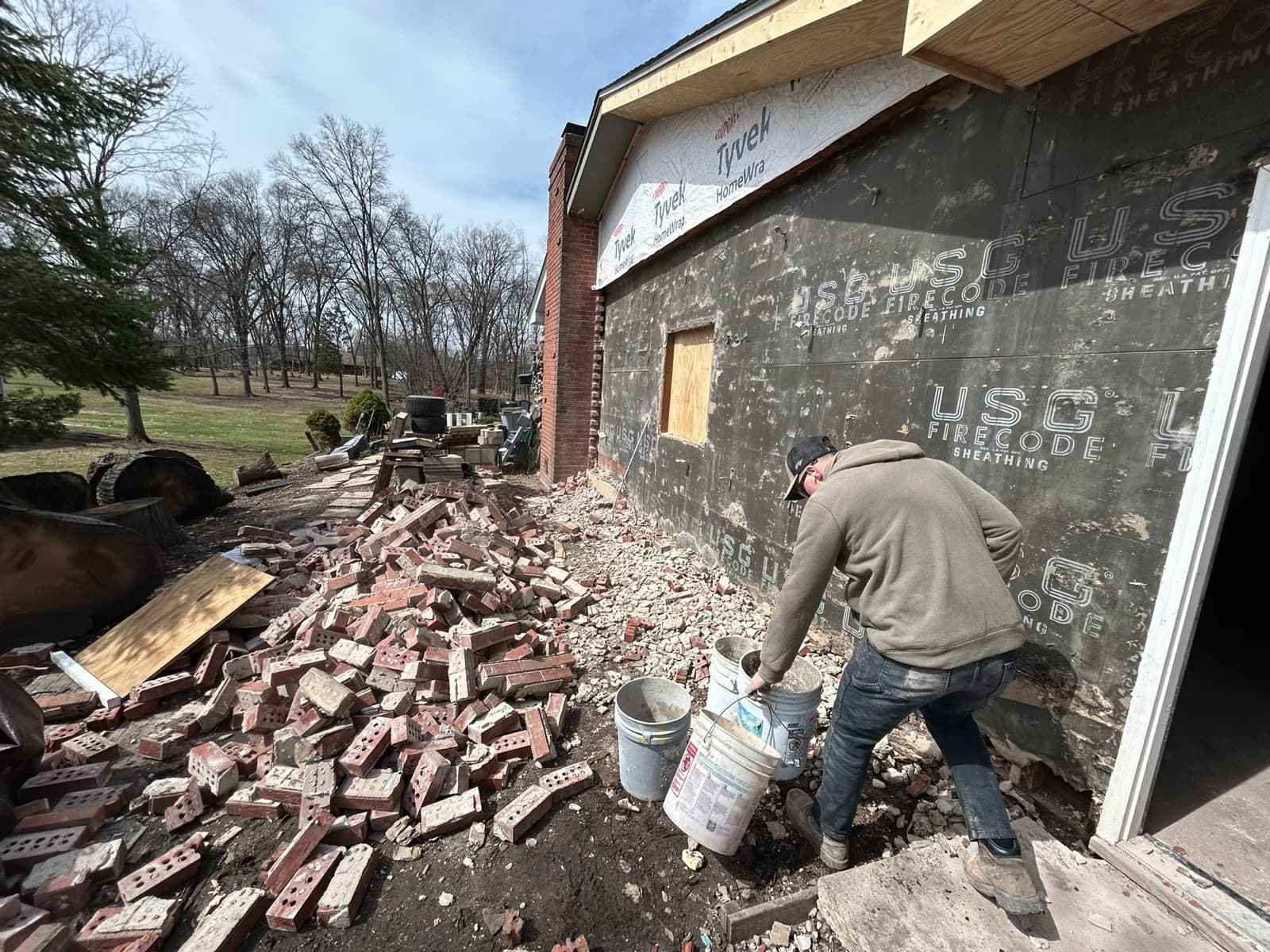Brick Garage Wall Rebuild — before