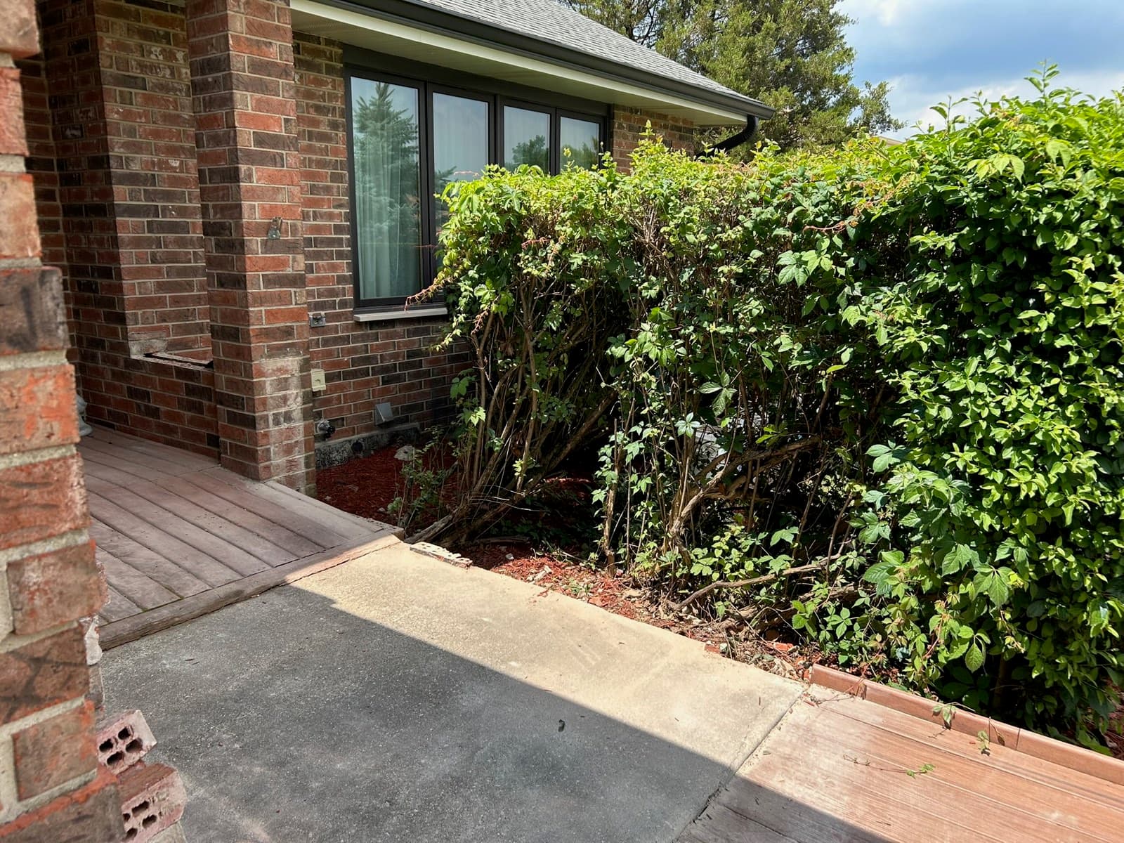 Brick Front Porch Restoration — before
