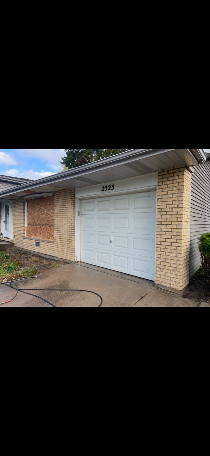 Brick Garage Wall Repair — completed