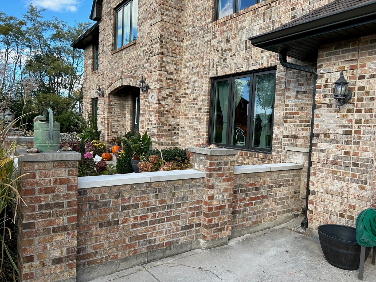 Color-matched replacement brick set into a repaired wall on an Orland Park, IL home by Paul Lally's Masonry