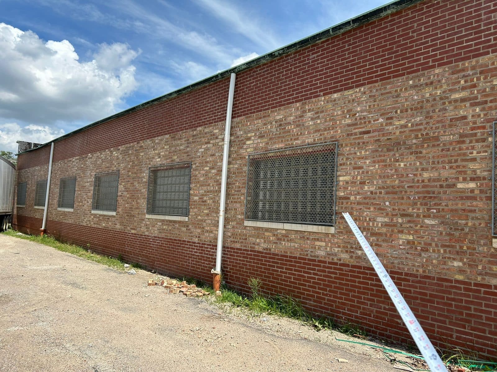 Repointed and repaired foundation masonry at grade on a Frankfort, IL home by Paul Lally's Masonry