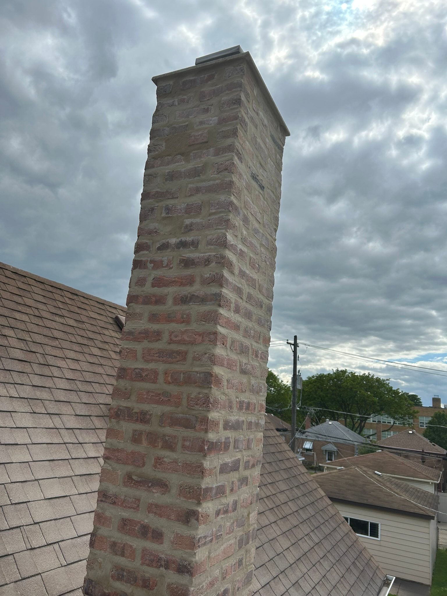 Chimney Repair Chicago: The 4 Parts That Fail First (Crown, Cap, Flashing & Mortar Joints)